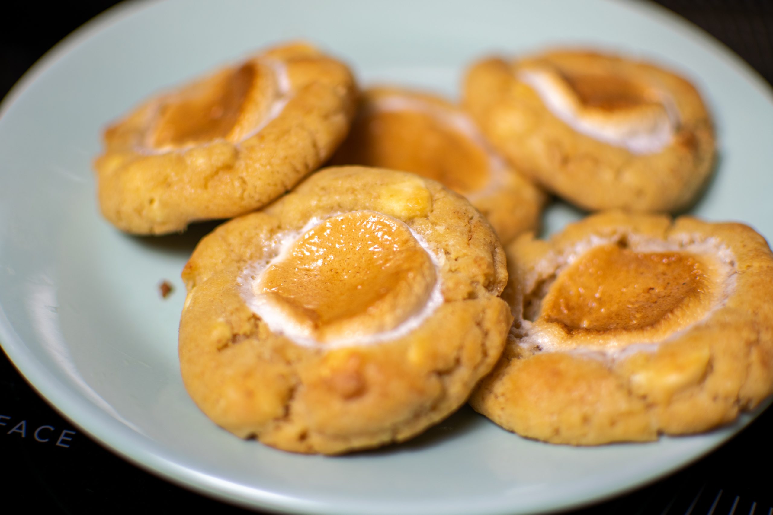 white chocolate chip s’mores freezer cookies with toasted marshmallow tops