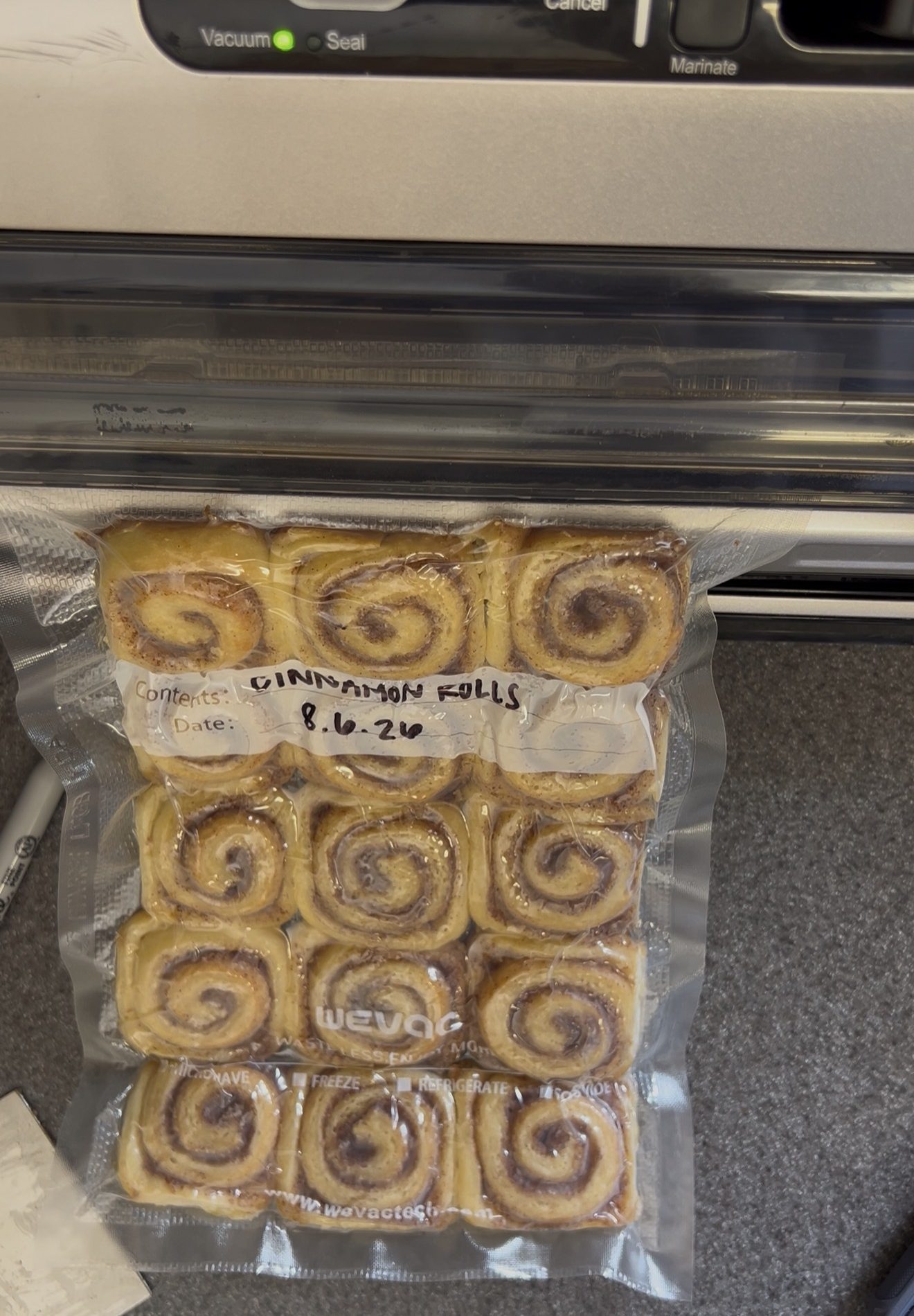 Vacuum-sealed pack of mini cinnamon rolls in a WeVAC bag